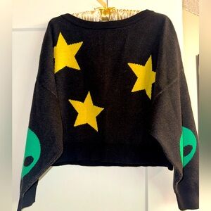 Dressed in lala cropped alien and star sweater. Worn once, never gets any use!